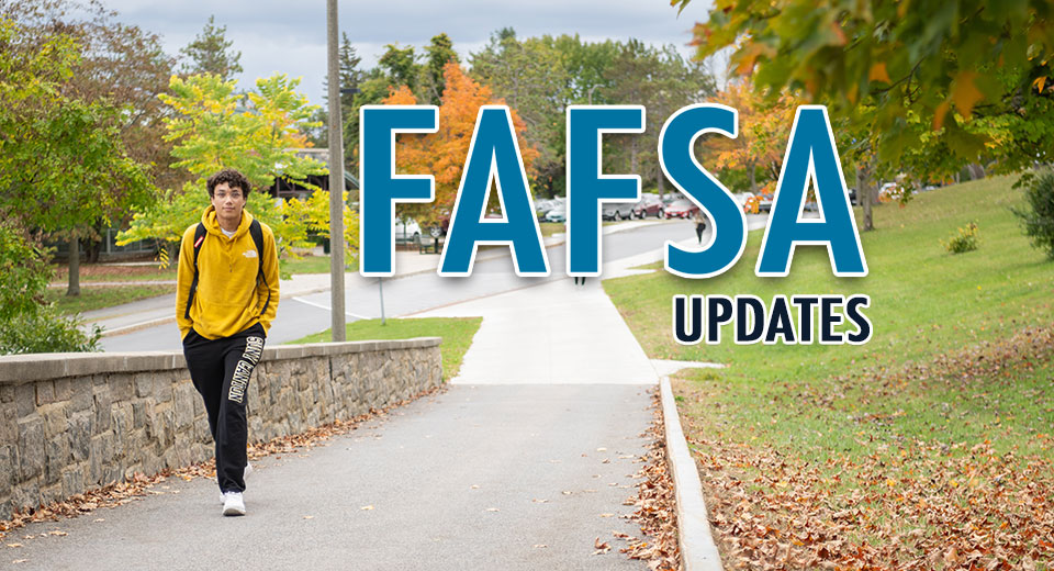 FAFSA Updates - A student walks up a campus ramp way.