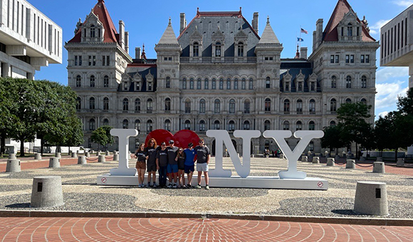 Liberty Partnership students standing in front of the New York State capitol building in Albany.