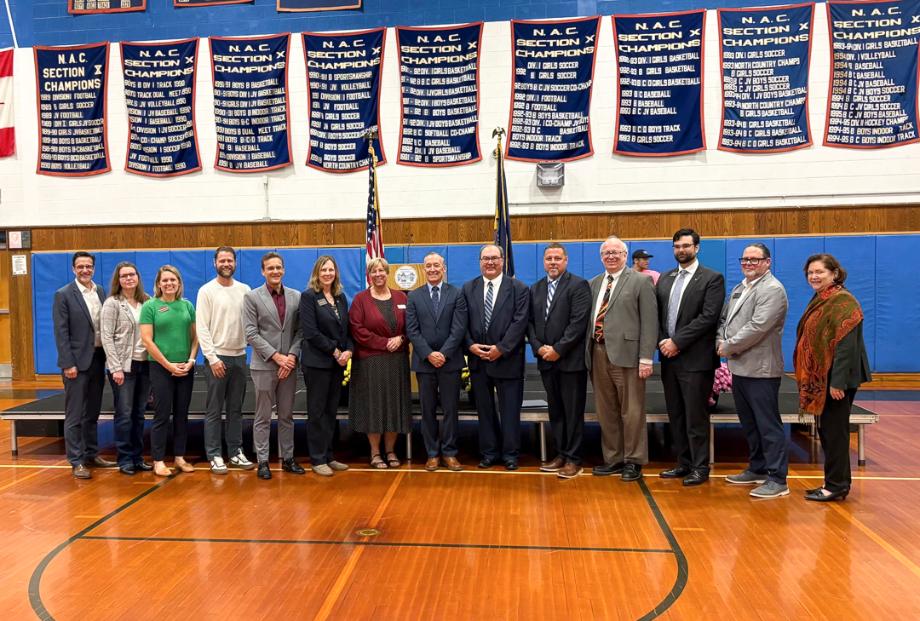 A group of officials and college representatives at The Ogdensburg Promise unveiling event.
