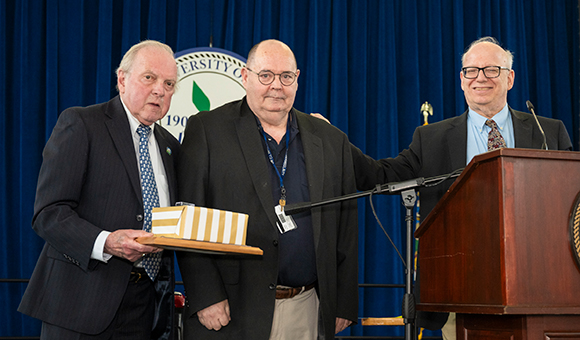 Andrew Wood with Ronald O'Neill and President Szafran.
