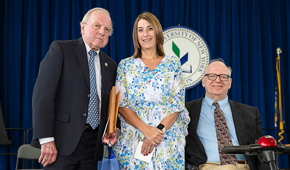 Beth Gravlin with Chairman Ronald O'Neill and President Szafran.