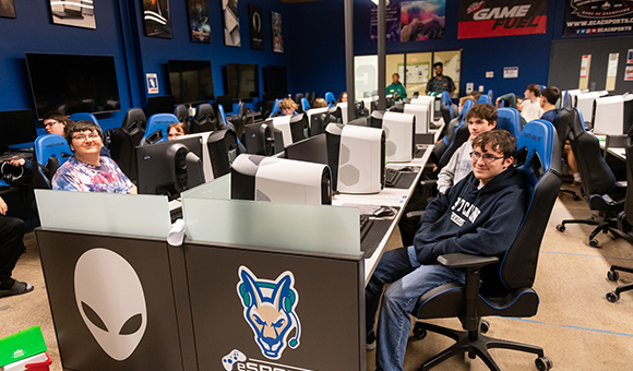 CFES students work at computer workstations in the Esports Arena.
