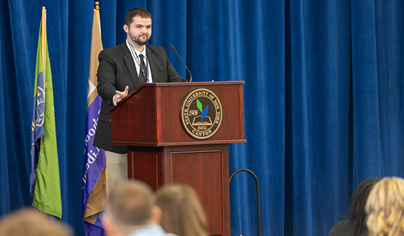 Daniel DePhilippis addresses the collected scholarship recipients and their patrons at the 2023 Scholarship Luncheon.