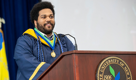 Evan Velasquez speaks at Commencement 2025.