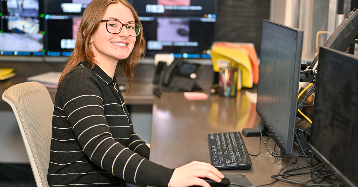 Gracie Wheeler sits at a computer.