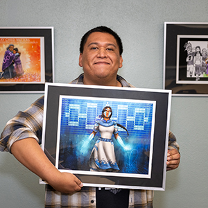 Honni David holds up his fan art of Marvel's Mohawk character, Kahhori.