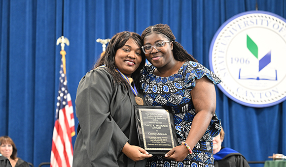 Priscilla Collins presents Cassidy Asiamah with the Northstar Award.