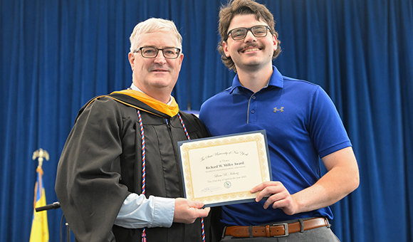 Dean Micheal Newtown presents the Richard Miller Award to Liam Hohertz