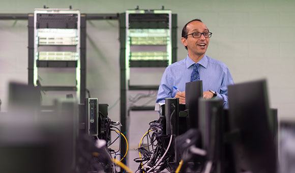 Assistant Professor Kambiz Ghazinour teaches in one of the college's computer labs.