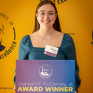 Madison Parker holds the Norman R. McConney, Jr. award.