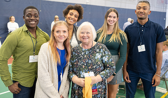 Scholarship recipients stand with SUNY Canton Distinguished Professor Emeritus Linda L. Fay at the 2023 Scholarship Luncheon celebration.