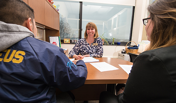 Sharon Tavernier advises two students on program pathways.