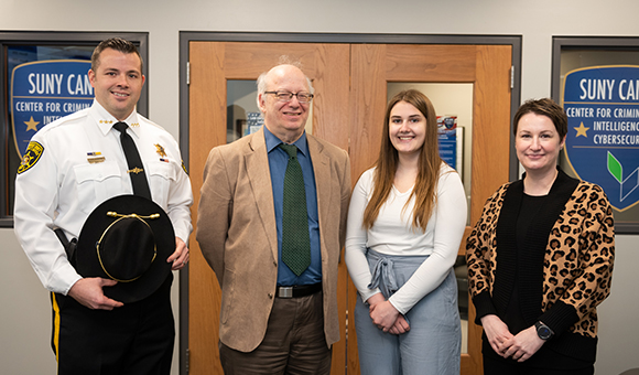 Undersheriff Sean O'Brien, President Zvi Szafran, Brooke Ayers, and Liz Brown