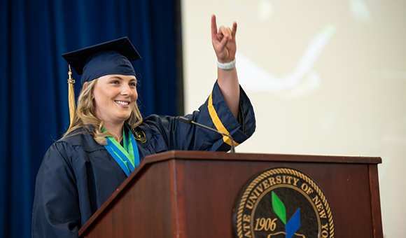 Outstanding Associate Degree Award winner Gracyn Emmerton concludes her speech with a