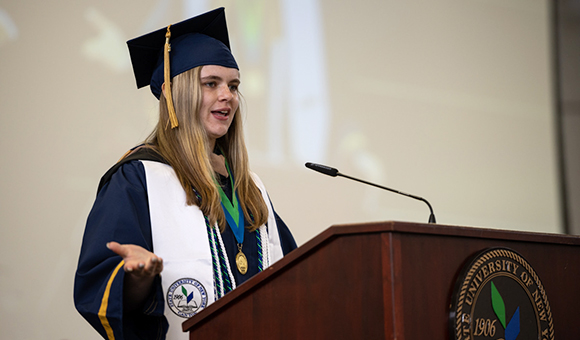 Student Government President Abigale Fink delivers the class address.