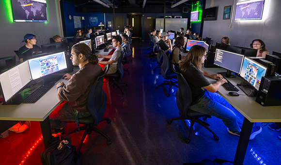 Students compete in a cyber attack challenge in the Cybersecurity lab.