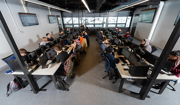Students work in the Cybersecurity classroom.