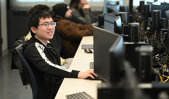 Students working in the Cybersecurity lab.