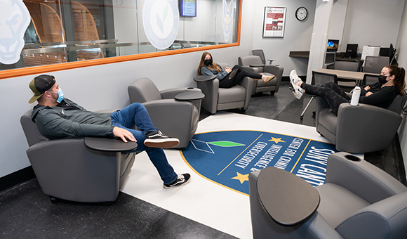 Students hang out in the new Dana Hall Student Lounge.