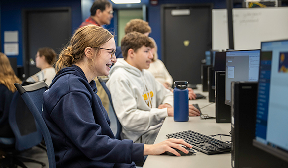 Jamison Zysik cracks passwords in SUNY Canton’s Cyber Security classroom.