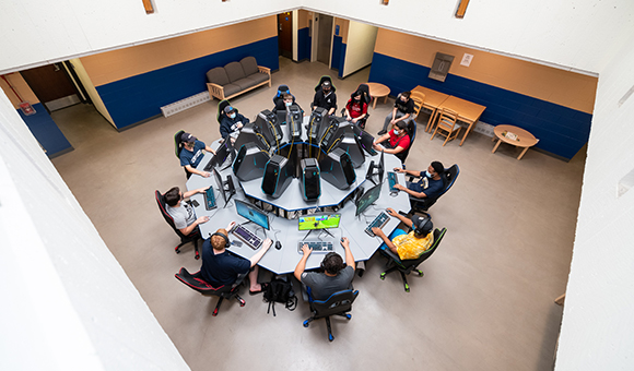 Students game on 10 machines in the Esports Wing common area.