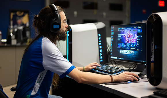 Garrett Bresett prepares to play League of Legends in SUNY Canton’s Esports Arena.