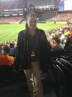 Johanna Evans-Welp working game day at Camden Fields during her internship with the Baltimore Orioles.