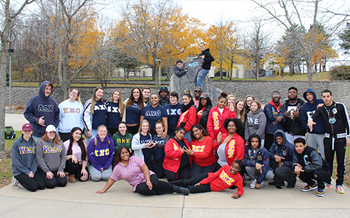 Greek organizations pose in the Roselle Plaza.