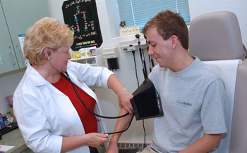A student gets a blood pressure test in the Health Center.