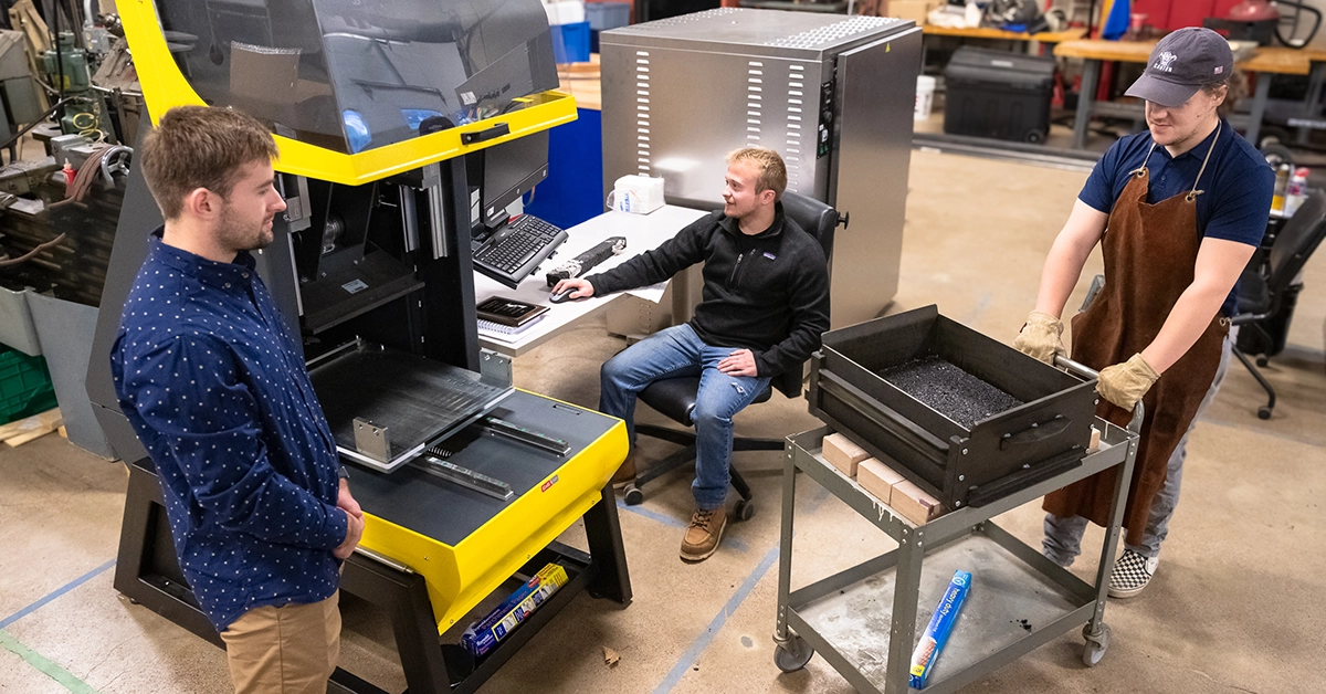 Students work in the asphalt research lab.