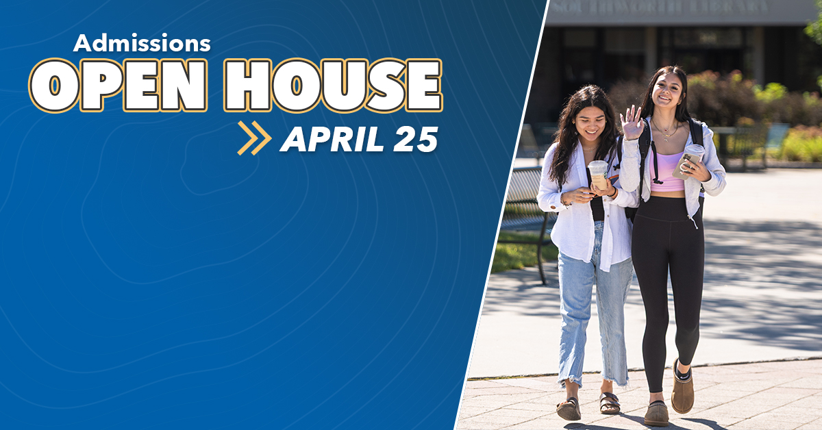 Admissions Open House - April 25 - Two students walking through the academic plaza.