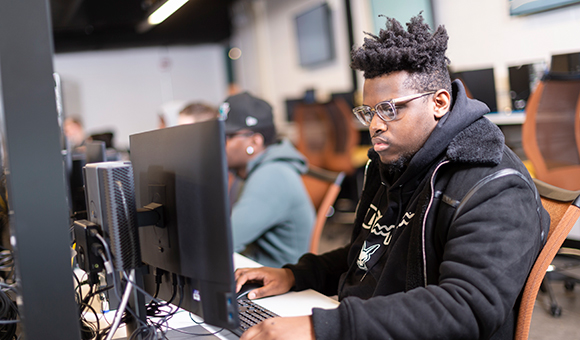 Students work in the Information Technology lab.