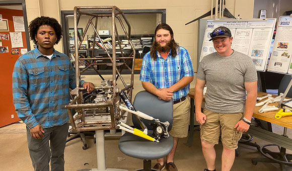Students pose with their Mechanical Capstone project.