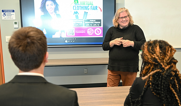 Julie Parkman presenting 'Dress for Success' as part of Micro Mondays.