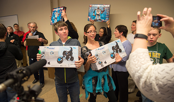 Dakota Way and Brittany LaForty hold their prizes at the end of the bridge building competition during SUNY Canton’s Engineers Week Open House in 2016.