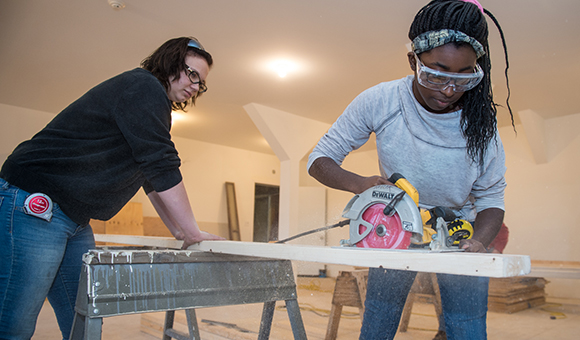 Construction Technology students cut lumber for the North Country Children's Museum