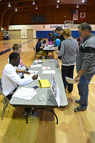 Students run the registration table.