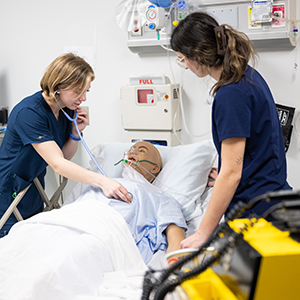 SUNY Canton nursing students practice life-saving techniques in the college's state-of-the-art simulation hospital classroom.