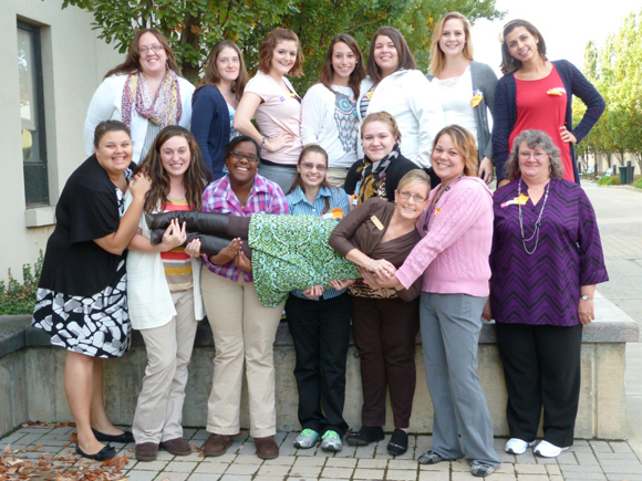 Students pose with Professor Maiocco