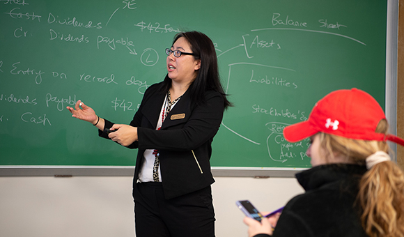 Associate Professor Ran Li teaches an accounting class.