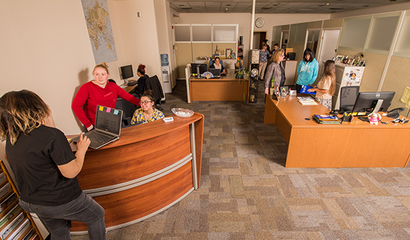 Students and staff work together in the Ready Center