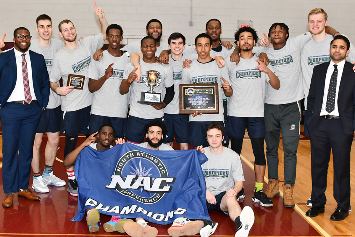 SUNY Canton Men's Basketball celebrates their 2019-20 NAC Championship.