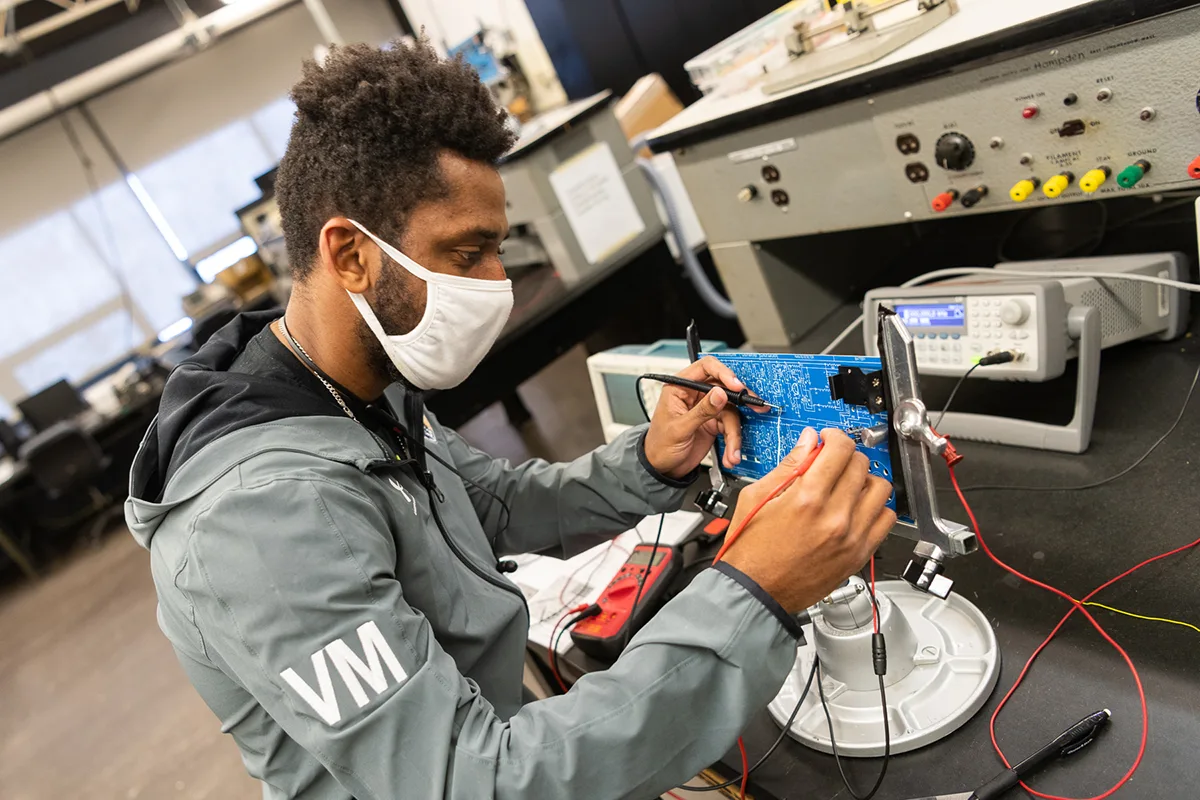 A student works on circuitry.