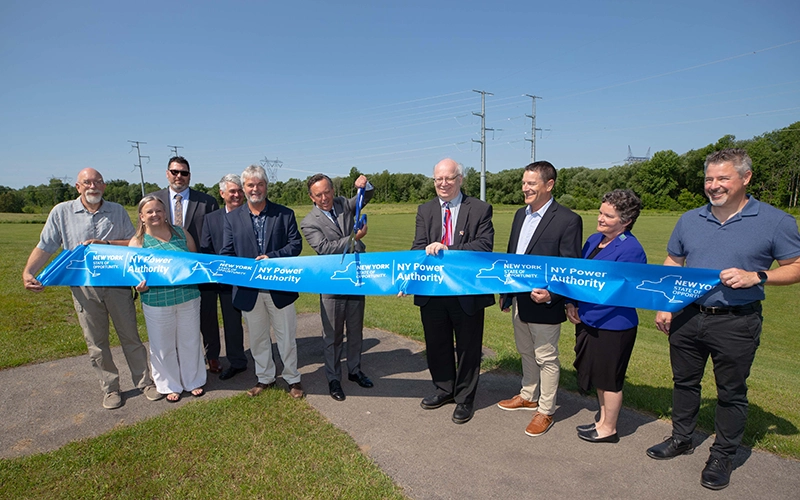 NYPA officials are joined by local officials to celebrate the Smart Path project completion with a ribbon cutting.