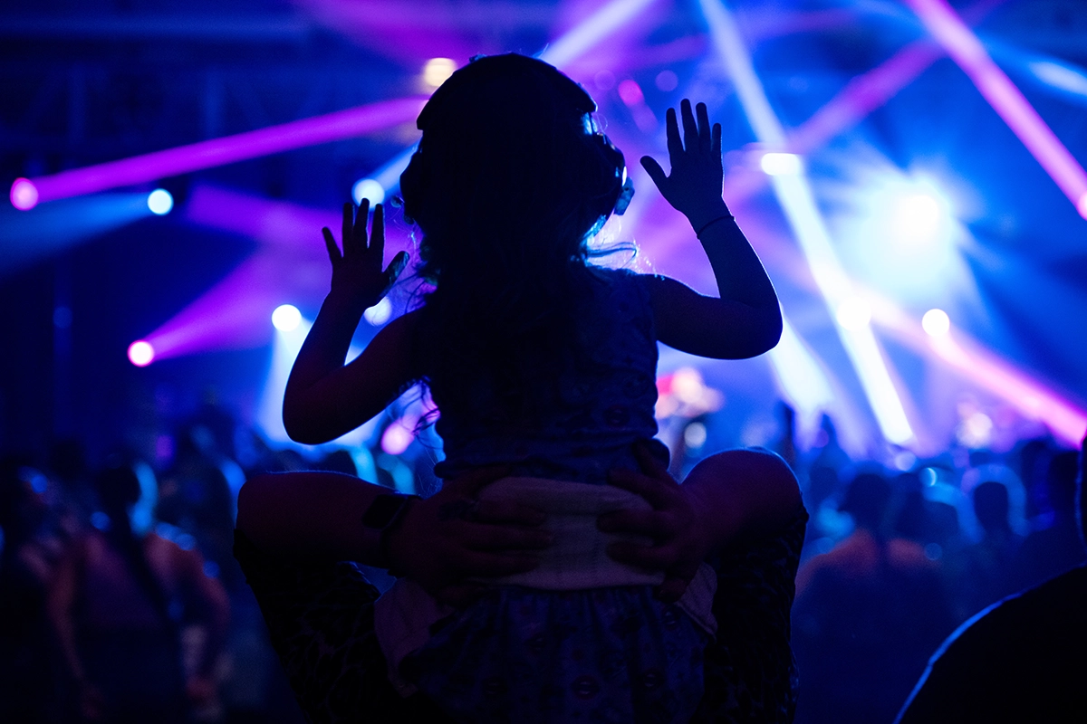 Silhouette of a child at the Flo Rida concert.