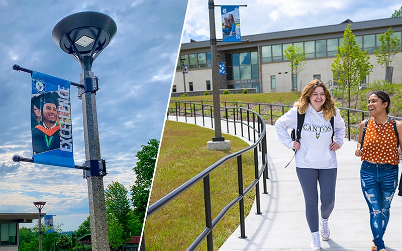 A light pole banner depicts a graduating student. Two students walk along the sidewalk outside French Hall with light pole banners adorning the plaza.