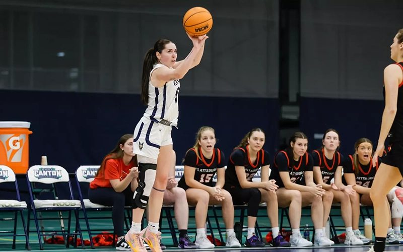 Natalie Bartle fires a jumper to clinch the Roos first ever SUNYAC playoff win against Plattsburgh.