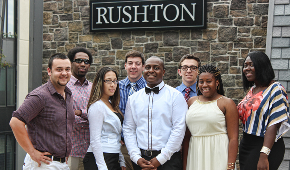 RA staff stand in front of Rushton Hall