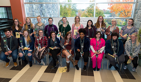 Students inducted into Tau Phi Zeta Honor Society