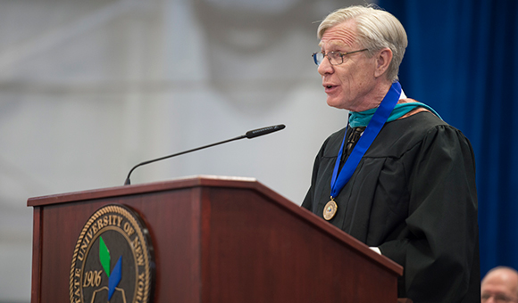 Professor Emeritus Barry Walch addresses students at Honors Convocation
